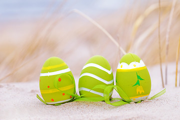 Image showing Easter decorated eggs on sand