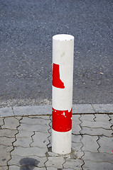 Image showing column prevents car to pass road prohibited area. 