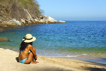 Image showing Sitting at the beach