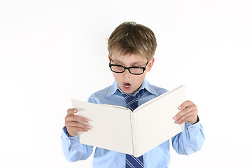 Image showing Child student reading a book