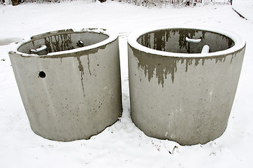 Image showing Concrete manholes in winter. waste water treatment 