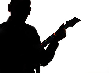 Image showing Silhouette of a man with guitar