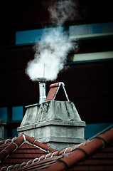 Image showing Small chimney with smoke