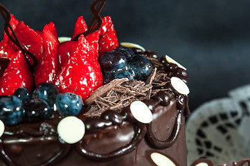 Image showing Delicious fruits on cake