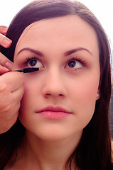 Image showing Girl getting makeup