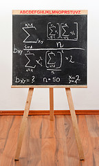 Image showing Black chalkboard with formula