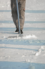 Image showing Worker cleaning the streets