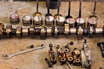 Image showing Camshaft of a car on wooden plate