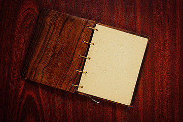 Image showing Wooden book on dark background