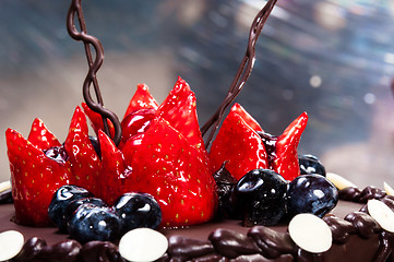 Image showing Delicious fruits on cake