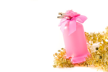 Image showing golden tinsel with pink glass decoration