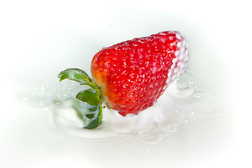 Image showing strawberry splashing into milk