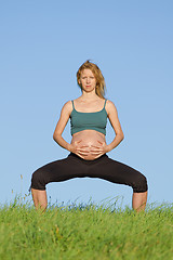 Image showing pregnant woman on meadow