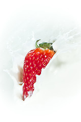 Image showing strawberry splashing into milk