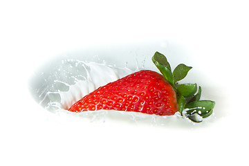 Image showing strawberry splashing into milk