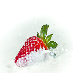 Image showing strawberry splashing into milk