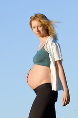 Image showing pregnant woman on meadow