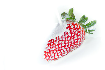 Image showing strawberry splashing into milk