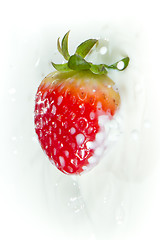 Image showing strawberry splashing into milk