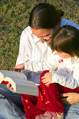 Image showing Mother and child reading