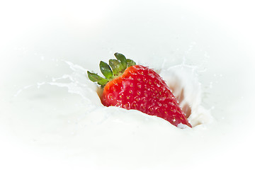 Image showing strawberry splashing into milk