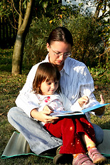 Image showing Mother and child reading