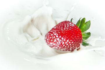 Image showing strawberry splashing into milk