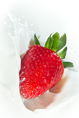 Image showing strawberry splashing into milk