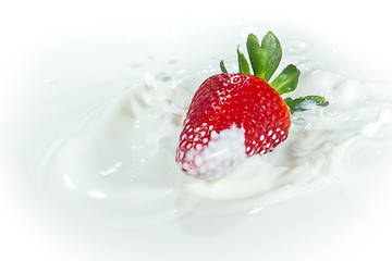 Image showing strawberry splashing into milk