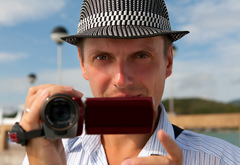 Image showing man in a hat with a camera