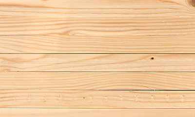 Image showing wooden planks laid horizontally, the background