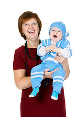 Image showing grandmother with her grandson in her arms in the studio