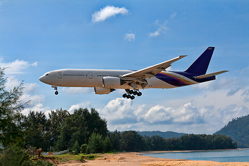 Image showing passenger aircraft over the beach