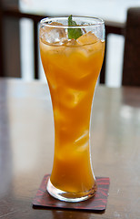 Image showing cocktail, mango juice with ice cubes