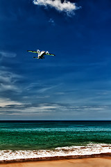 Image showing propeller aircraft comes in to land