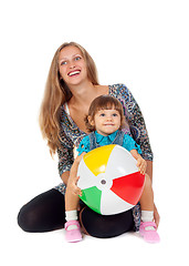 Image showing Mother and daughter playing in an inflatable ball