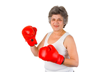 Image showing Female senior with boxing gloves