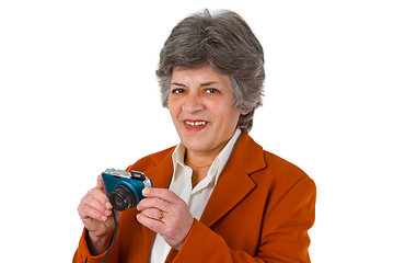 Image showing Female senior with camera 