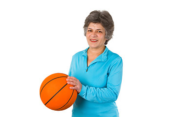 Image showing Female senior holding basketball 