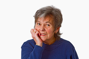 Image showing Thoughtful female senior