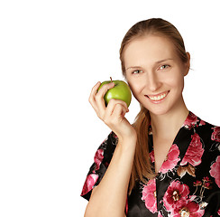 Image showing happy woman with agreen apple