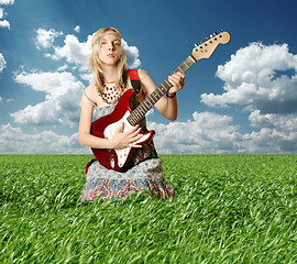 Image showing hippie girl with the guitar outdoor