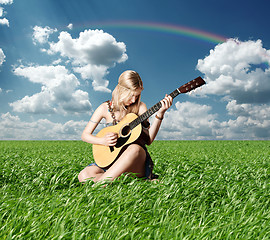 Image showing hippie girl with the guitar outdoor