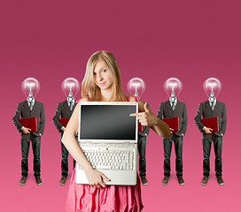 Image showing woman and lamp head businesspeople with laptop