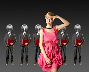 Image showing woman and lamp head businesspeople with laptop