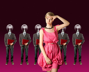 Image showing woman and lamp head businesspeople with laptop