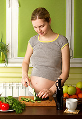 Image showing pregnant woman on kitchen