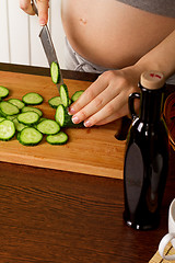 Image showing pregnant woman on kitchen