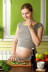 Image showing pregnant woman on kitchen