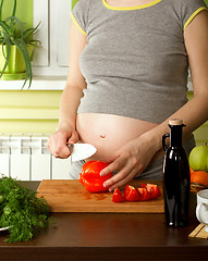 Image showing pregnant woman on kitchen